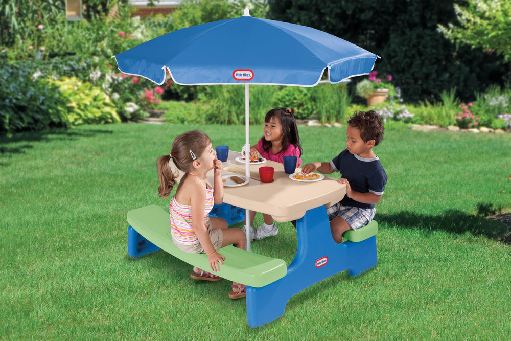 Little Tikes umbrella detail inserted in center providing shade and sun protection