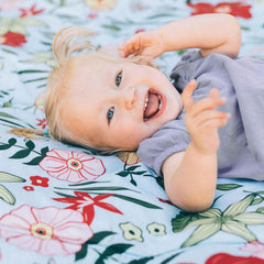 Little Unicorn exterior zipper pocket detail keeping essentials secure and sand-free benefit