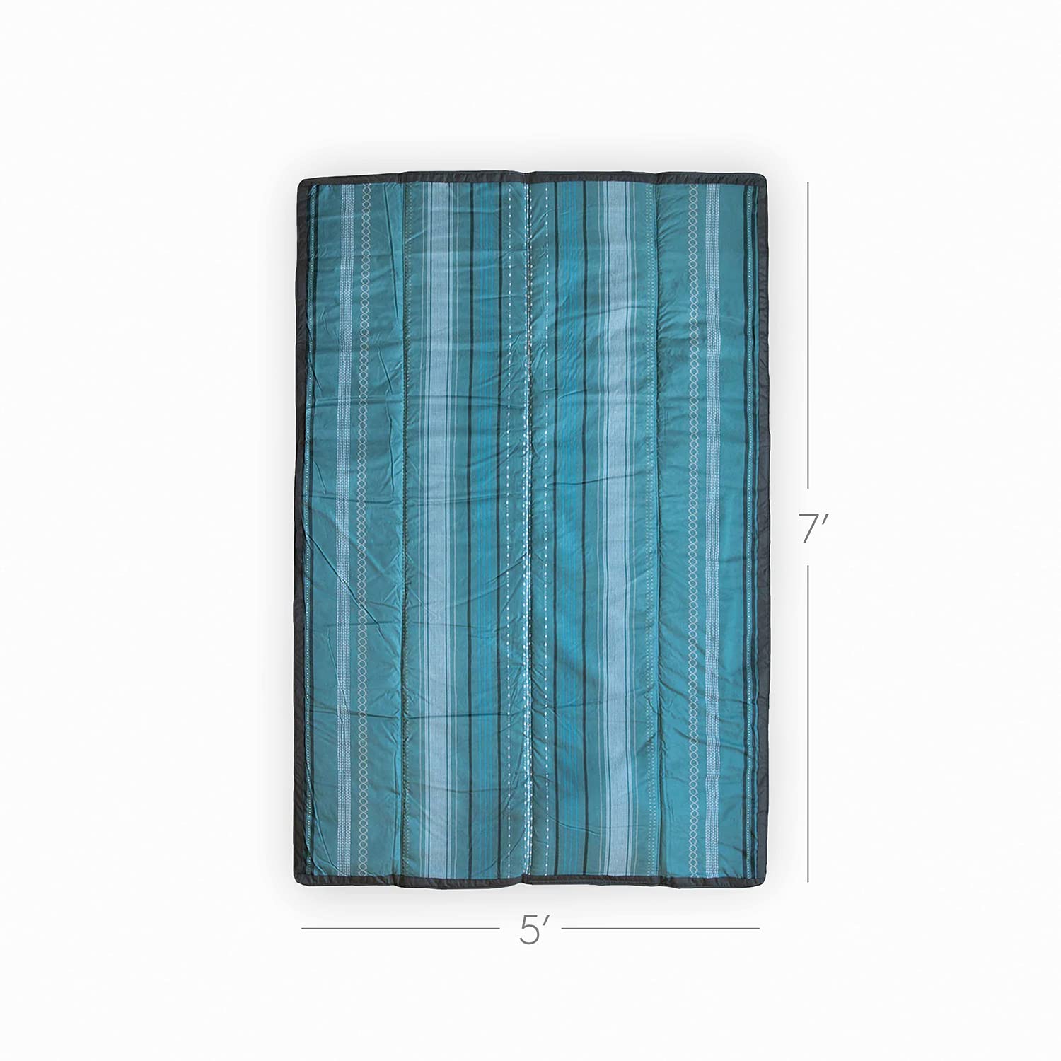 Little Unicorn Shoreline Stripe folded and packed compactly with strap, easy for travel