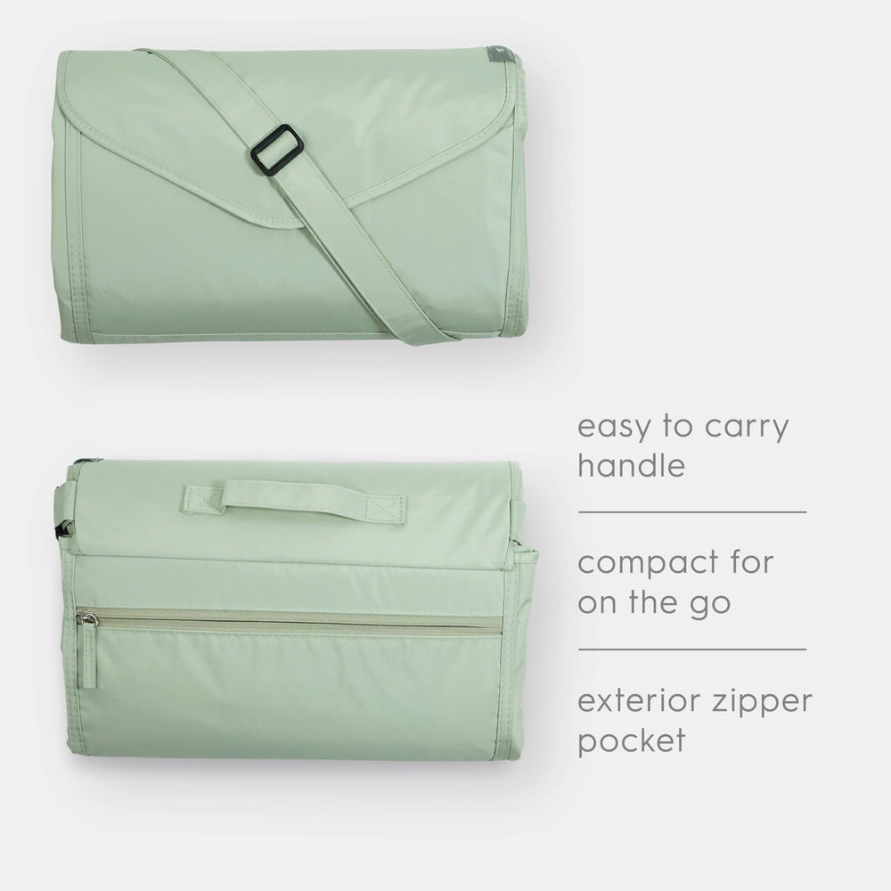 Little Unicorn exterior zipper pocket and handle detail for secure storage and quick grab