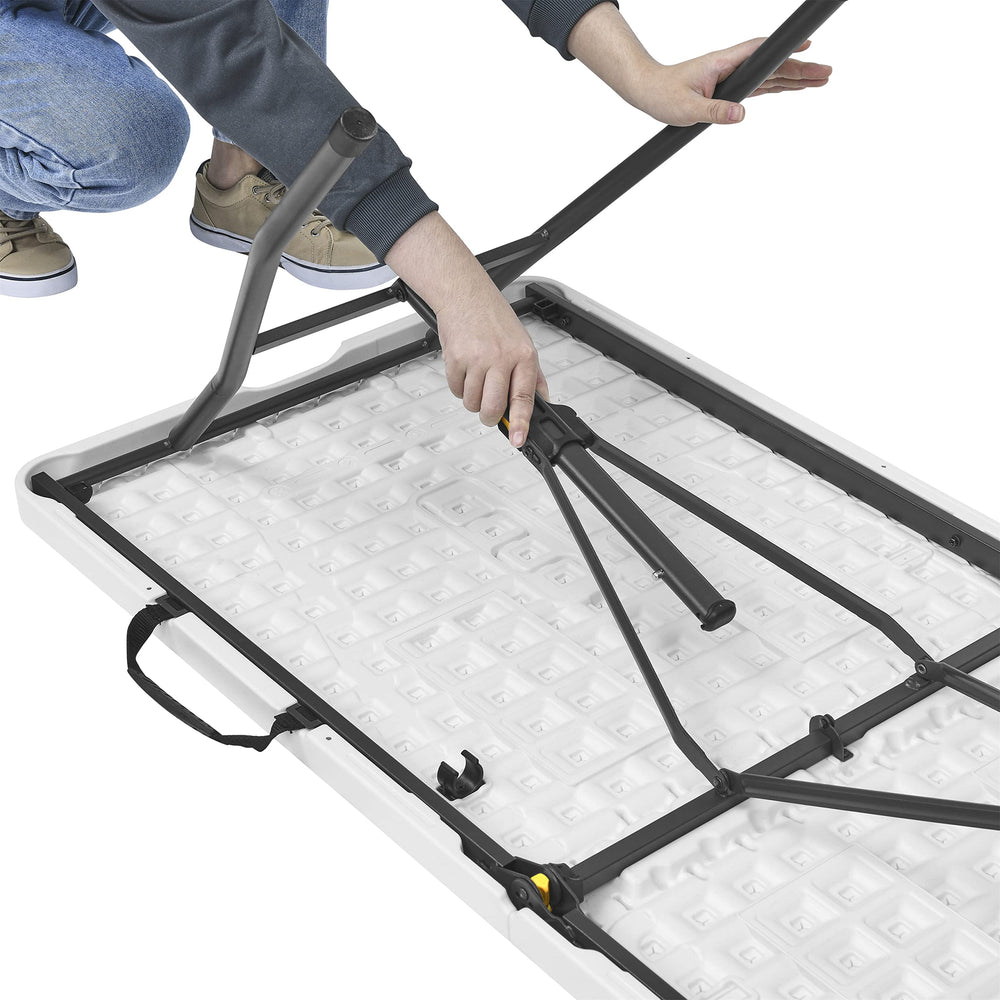Living and More table in outdoor picnic setup showing stability and party-ready benefit