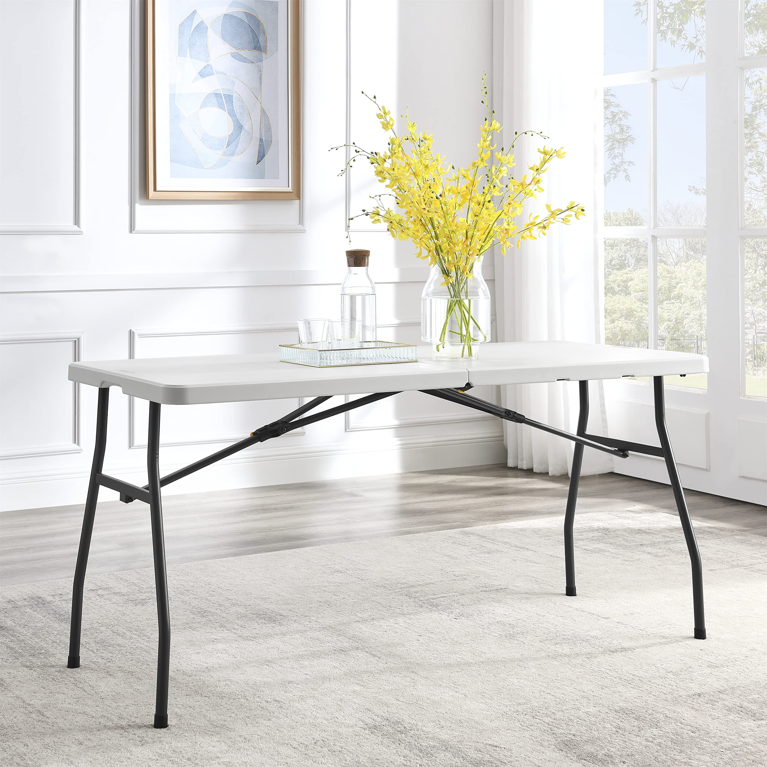 Living and More table beside chairs showing scale and seating capacity benefit