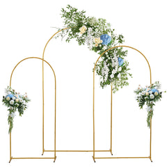 LMTNNB front view of three gold arches creating elegant ceremony focal point
