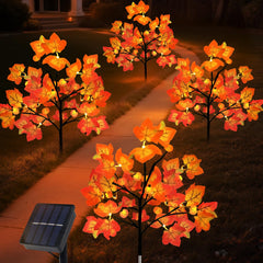 Lmtocs front view of four maple leaf and pumpkin solar stake lights showing festive design and curb appeal