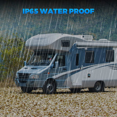 LNEX installed outdoors with water spray showing IP65 weather resistance