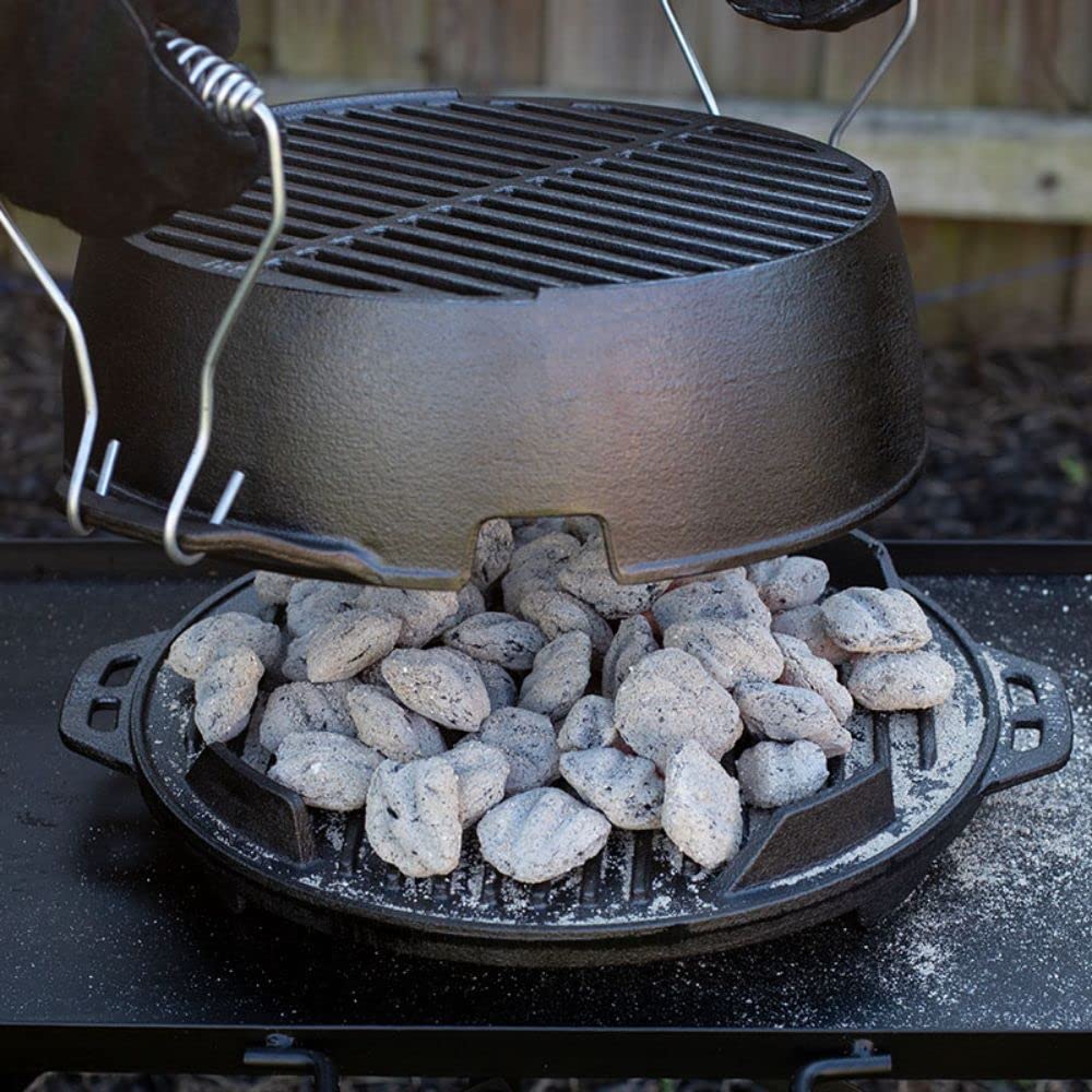 Lodge grill in use over campfire demonstrating stable heat retention benefit