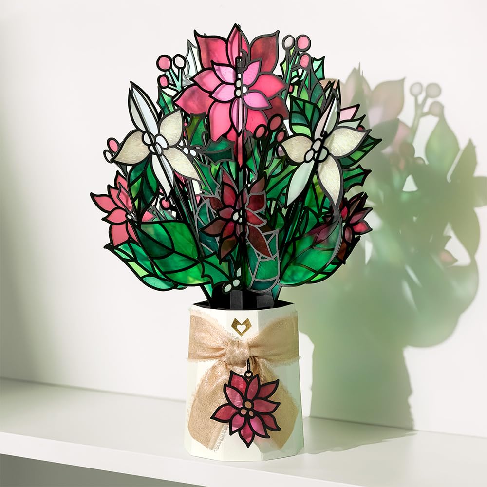 Lovepop poinsettia with blank notecard and envelope ready for a personalized message
