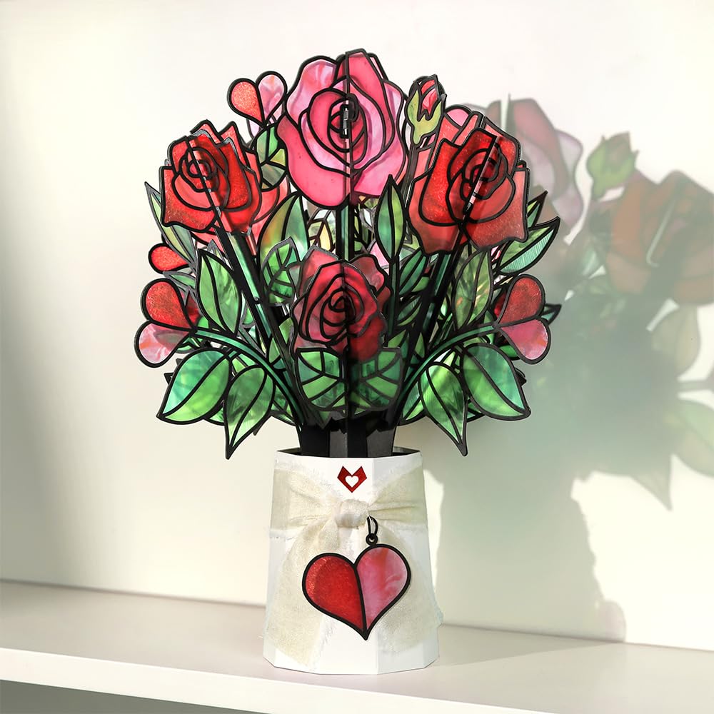 Lovepop suncatcher in window with sunlight filtering through providing colorful room accent