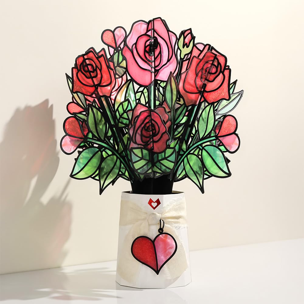 Lovepop bouquet held by hand to show 12-inch scale and ready-to-display size benefit