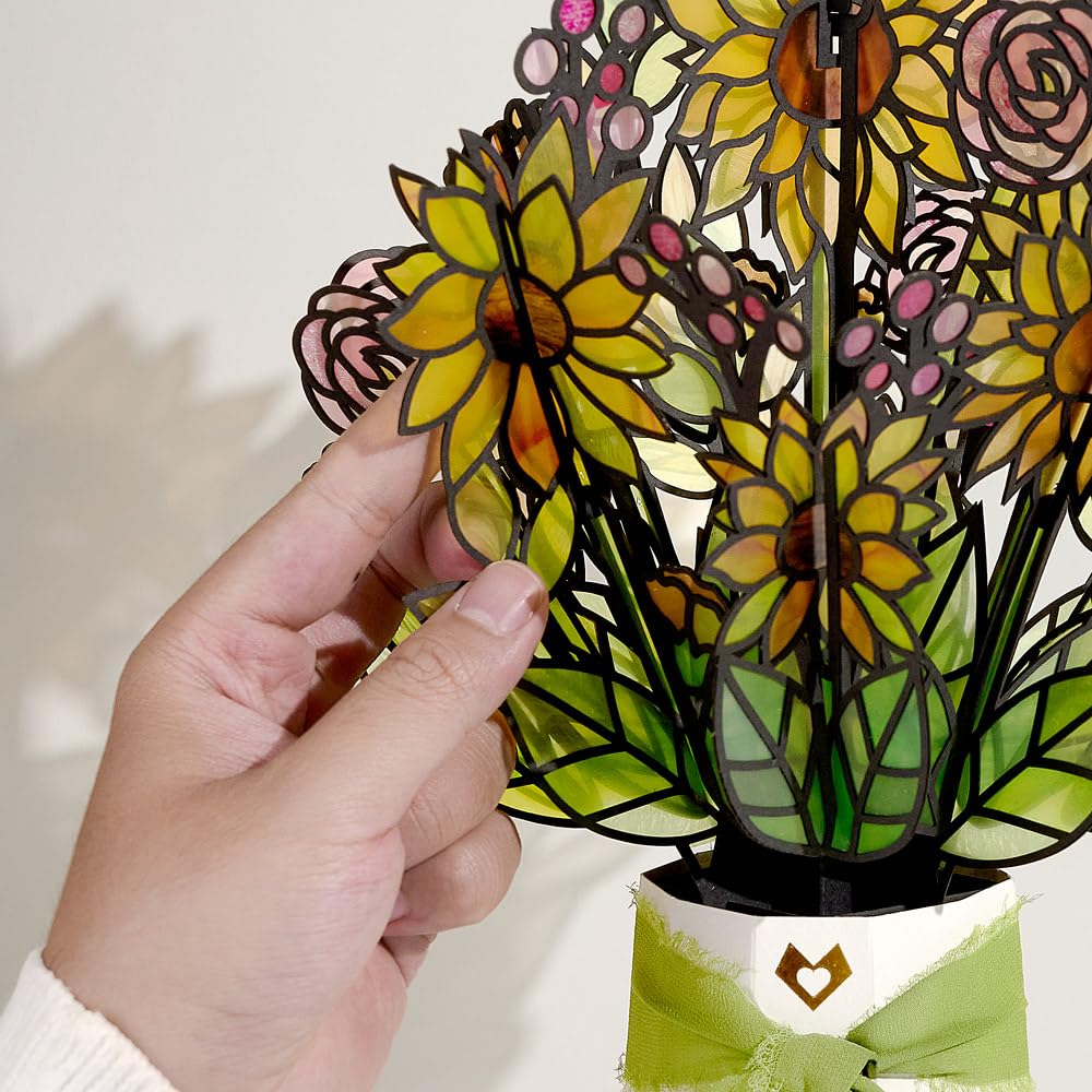 Lovepop translucent acetate petals scattering sunlight into colorful shadows