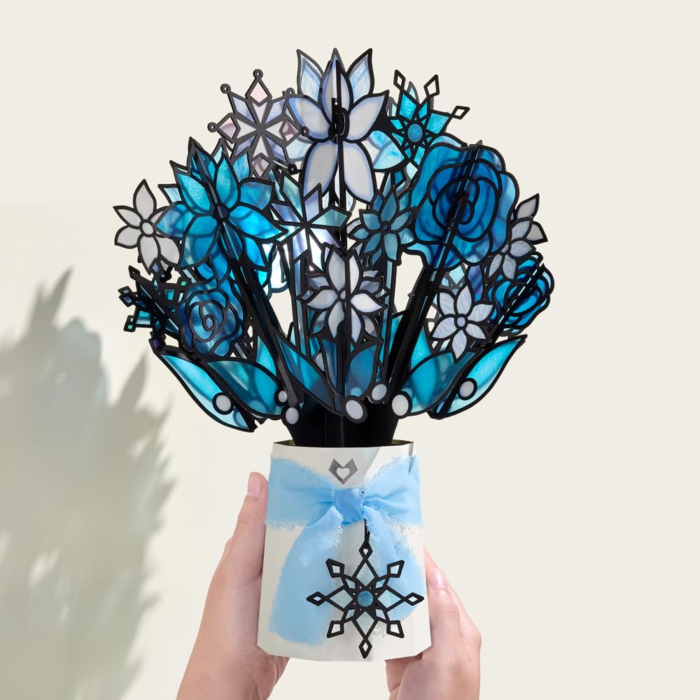 Lovepop blank notecard and envelope displayed with bouquet for personal message
