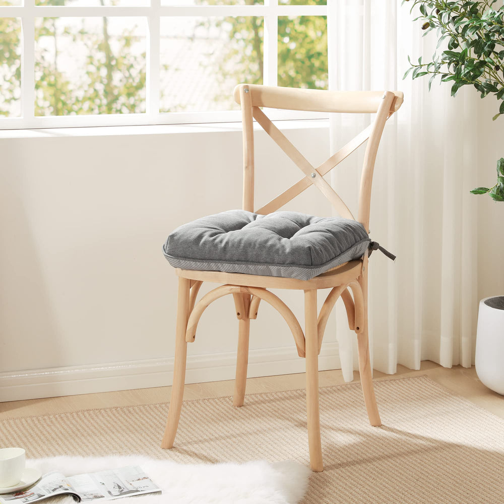 Love's cabin cushion on patio chair demonstrating weather-ready comfort for outdoor seating