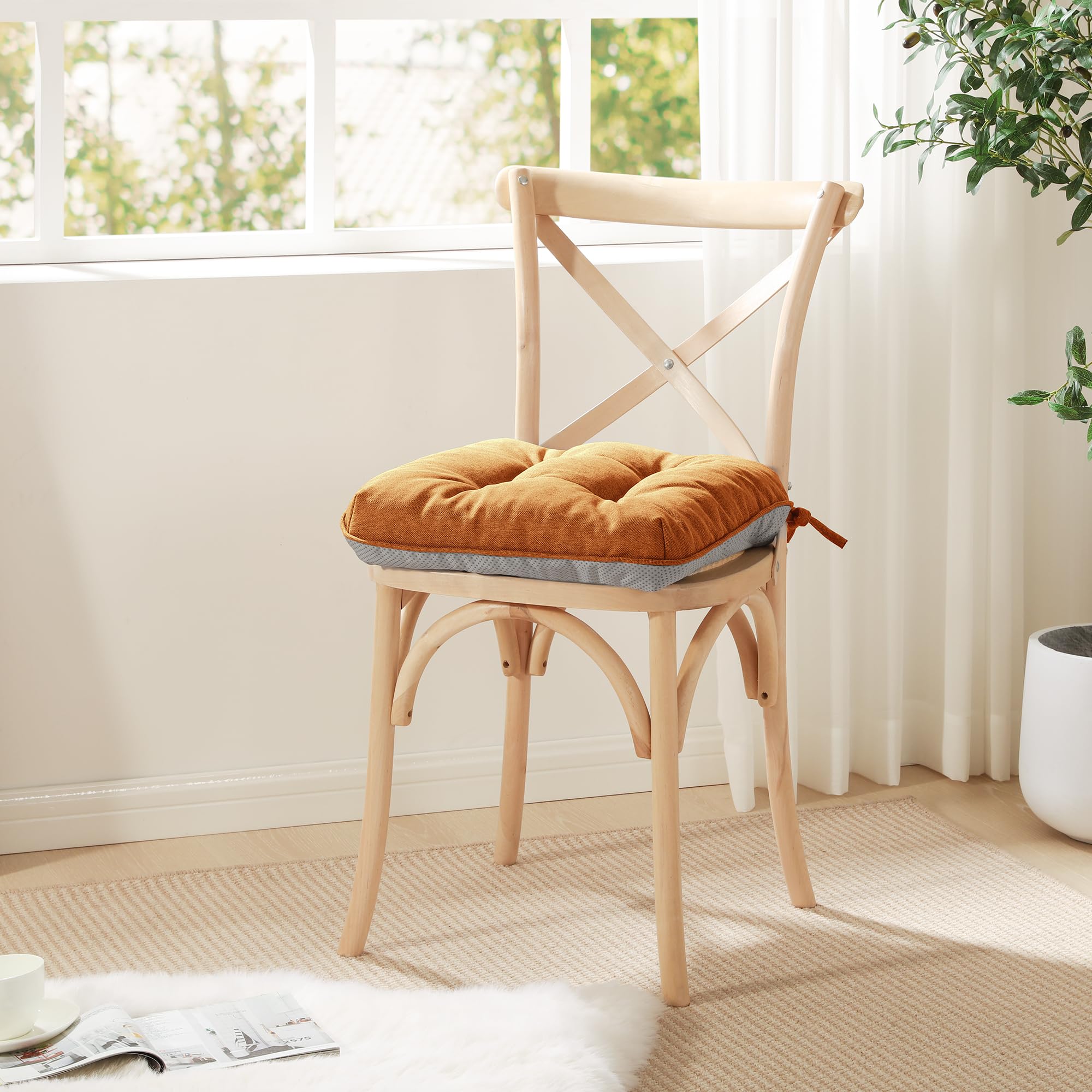 Love's cabin terracotta cushions styled in dining room adding warm, cozy look
