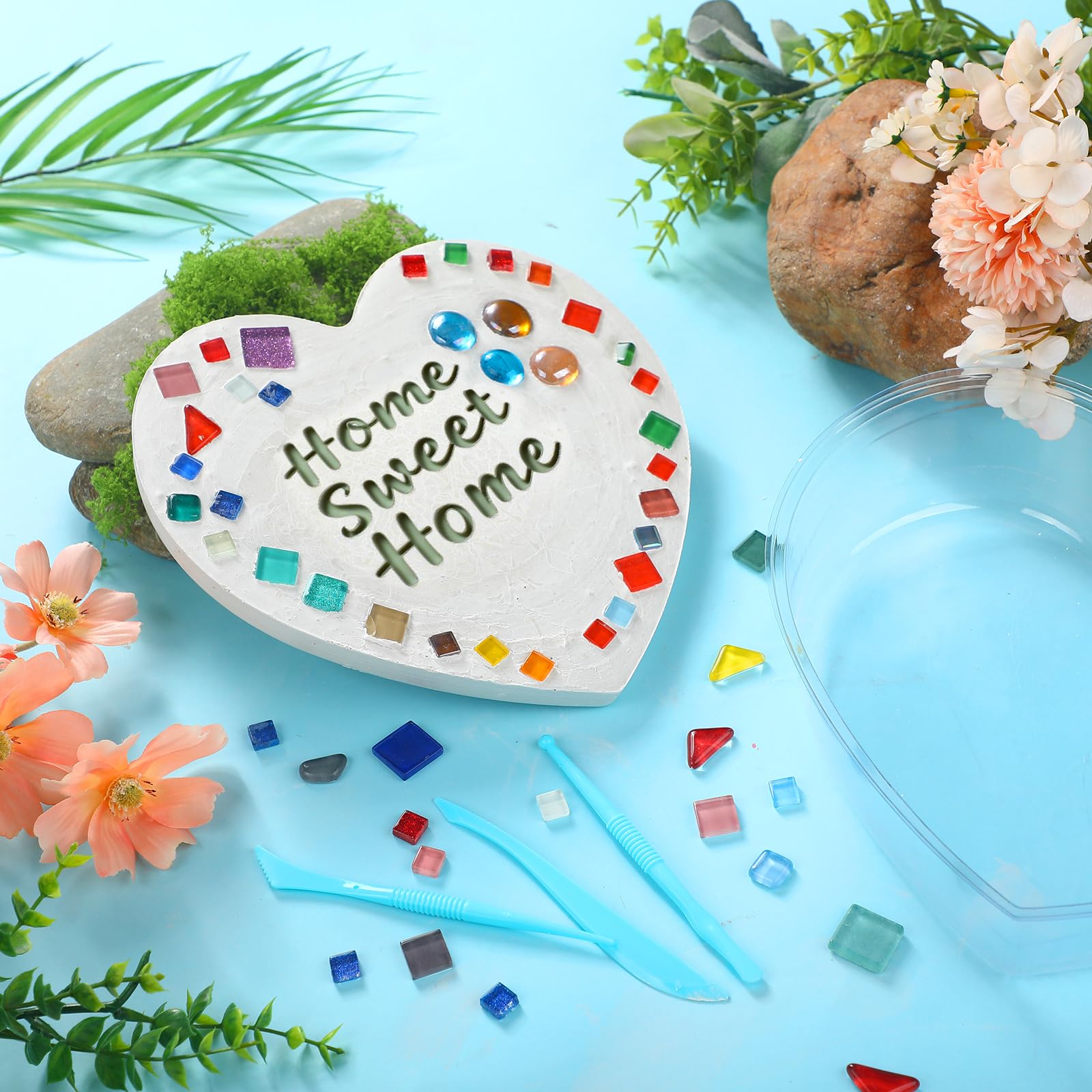 LOYIM kids and adult crafting together creating stones, promoting family creativity