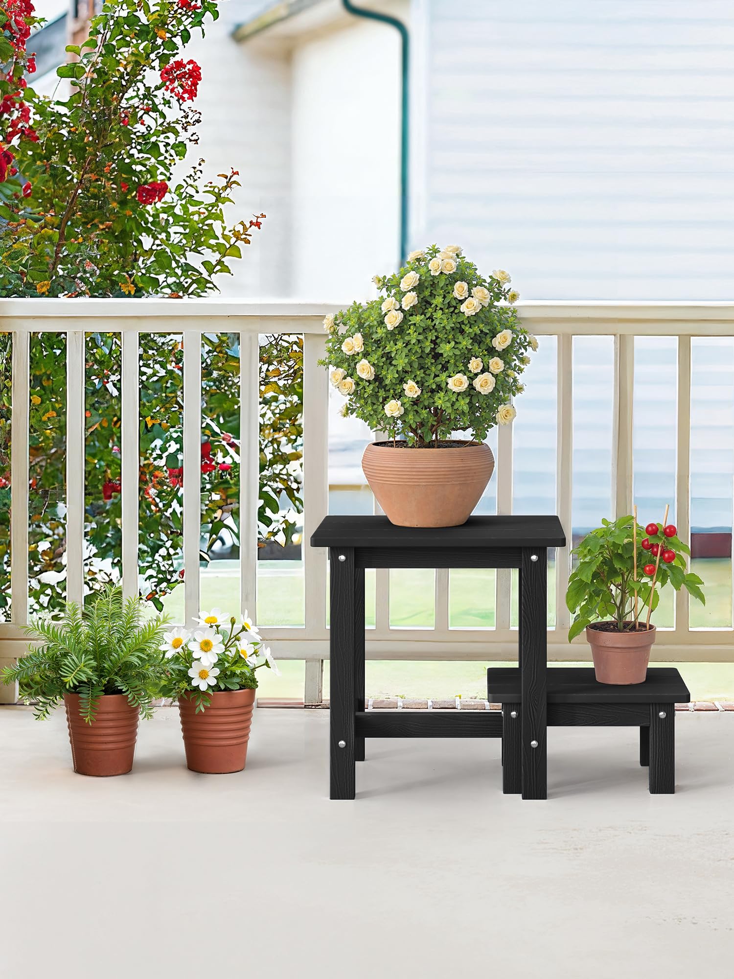 LUE BONA side table next to potted plant showing scale and versatile use