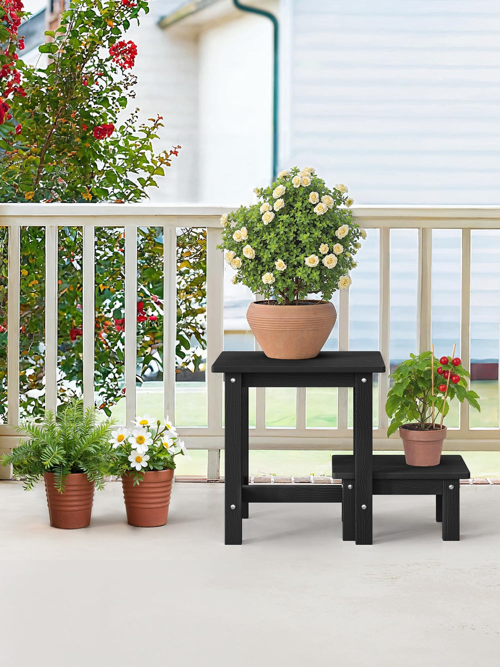 LUE BONA side table next to potted plant showing scale and versatile use