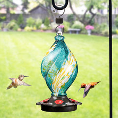 LUJII hand-blown glass close-up highlighting artisan spiral detail and shimmer