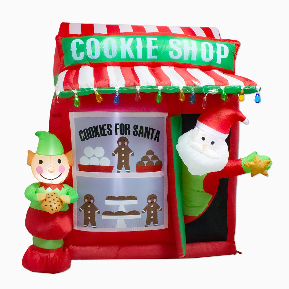 luxfcup yard display with inflatables creating welcoming holiday atmosphere