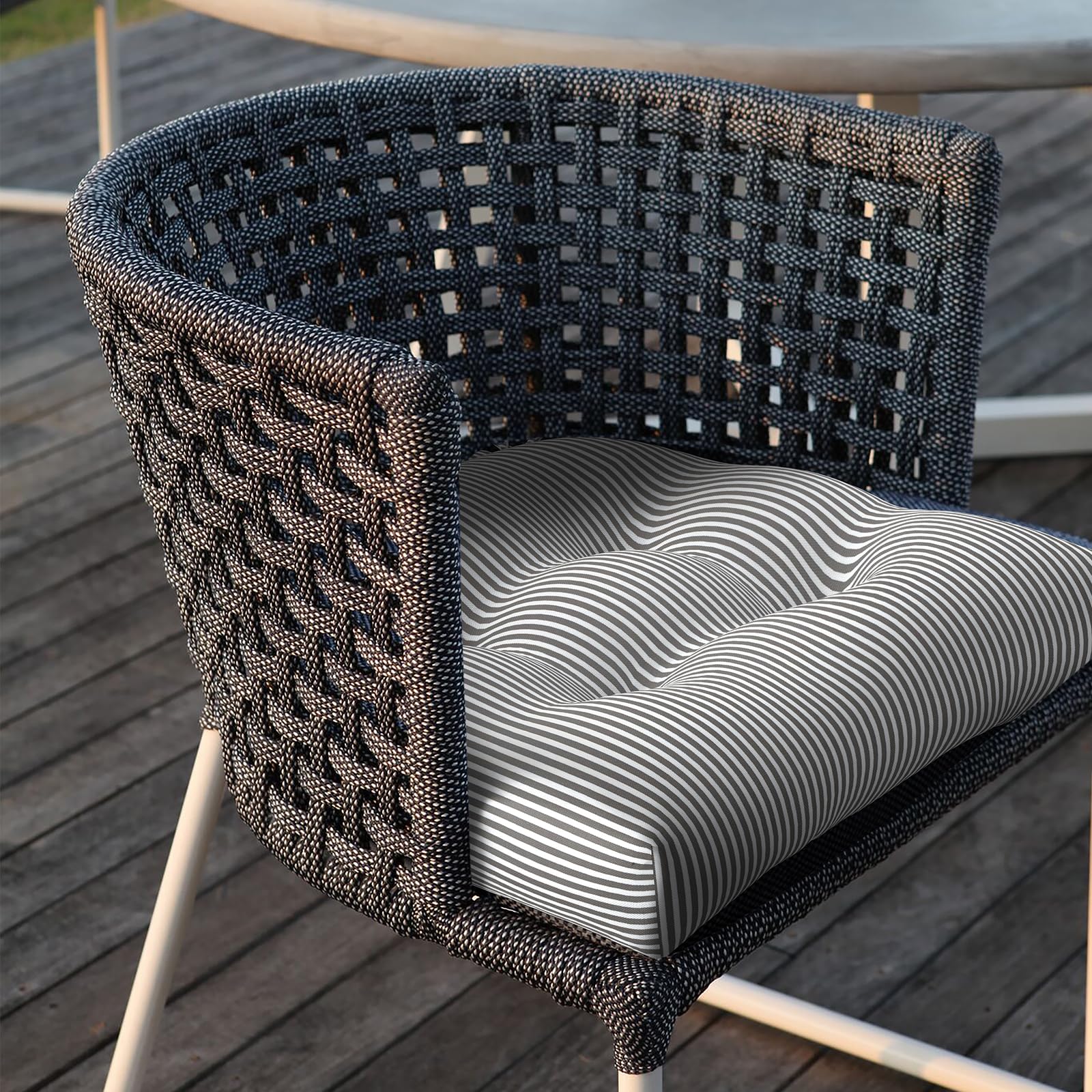 LVTXIII lifestyle patio dining setup showing coordinated cushions enhancing outdoor gatherings