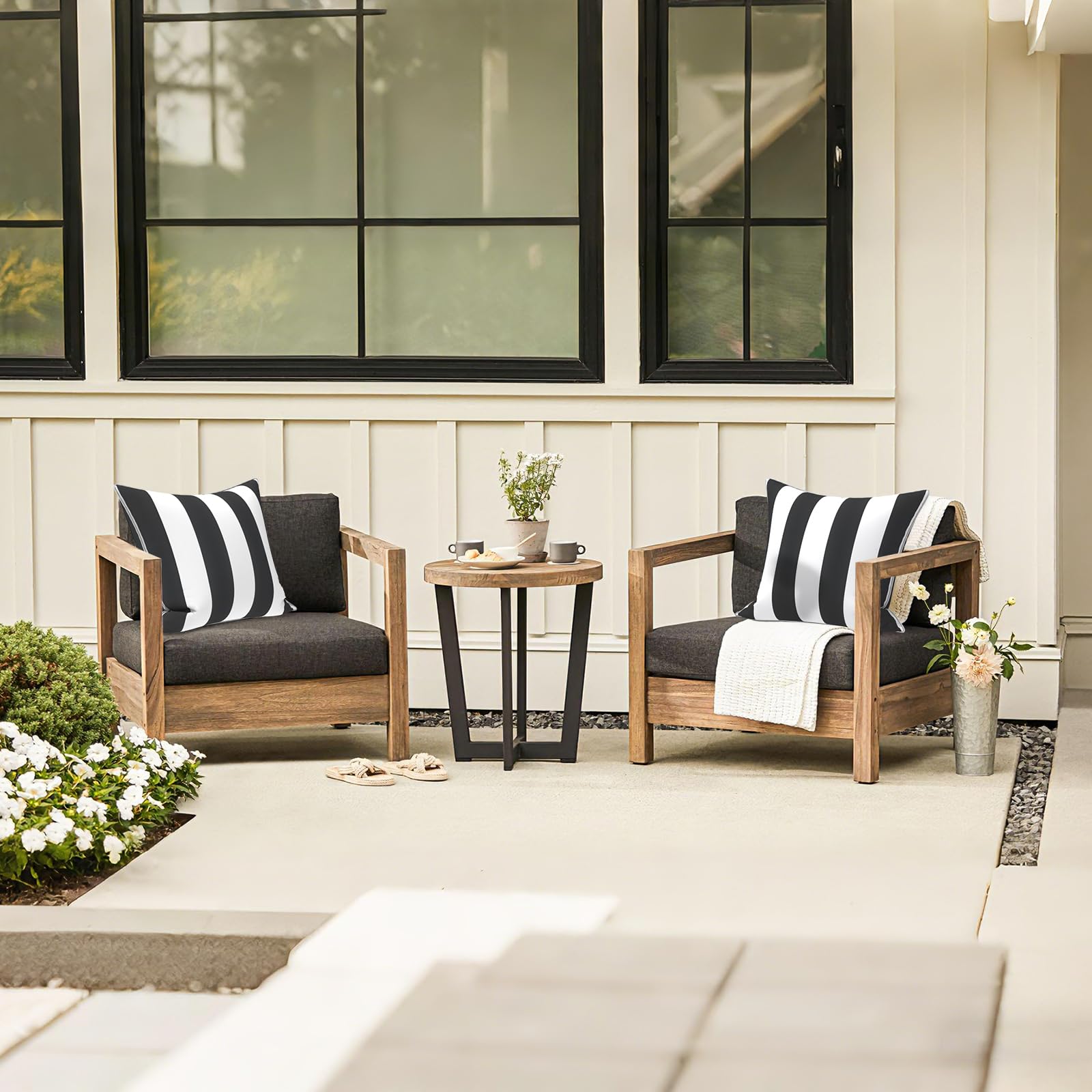 LVTXIII Cabana Black pillows staged on a patio sofa adding stylish durability benefit