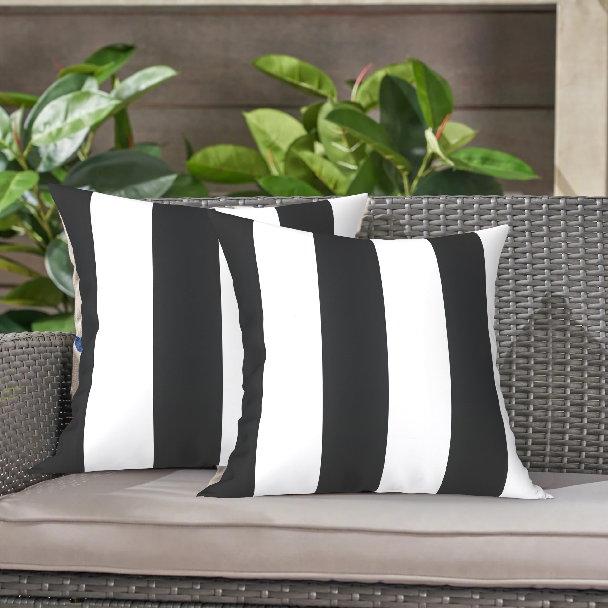 LVTXIII pillows on living room sofa demonstrating versatile indoor-outdoor styling