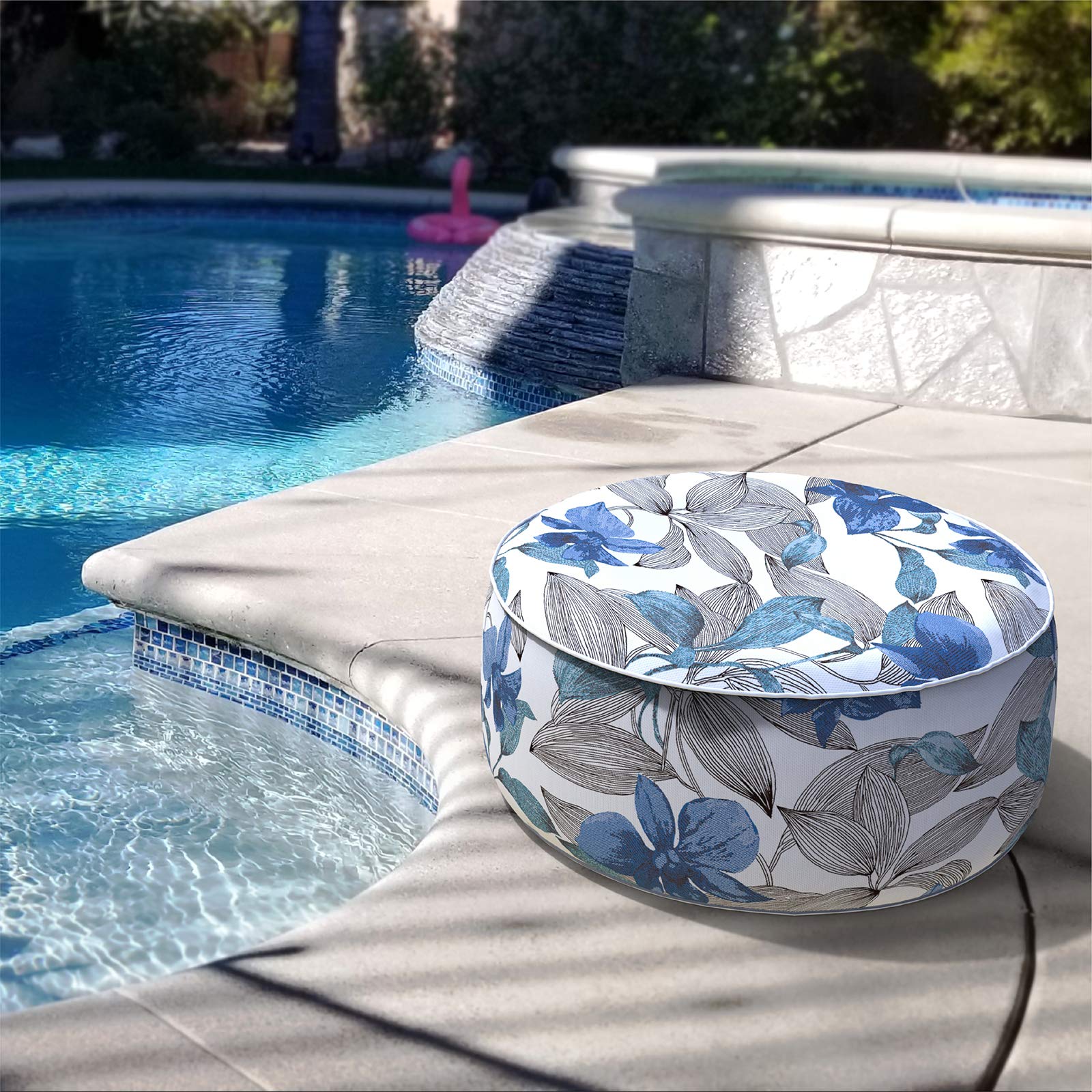 LVTXIII pouf next to a seated person showing size and scale for everyday use