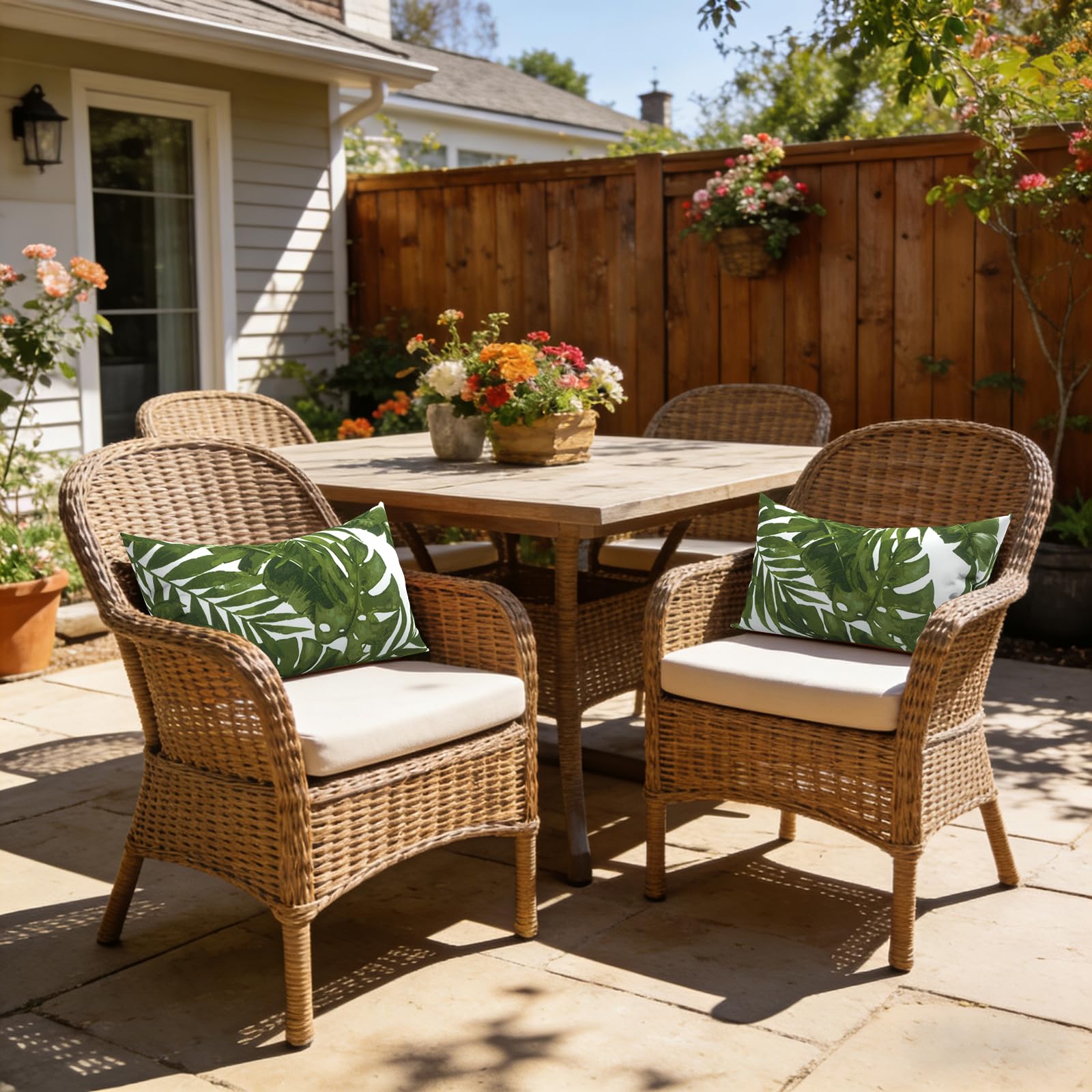 LVTXIII pillows on a garden bench illustrating weather-ready decor and cozy seating