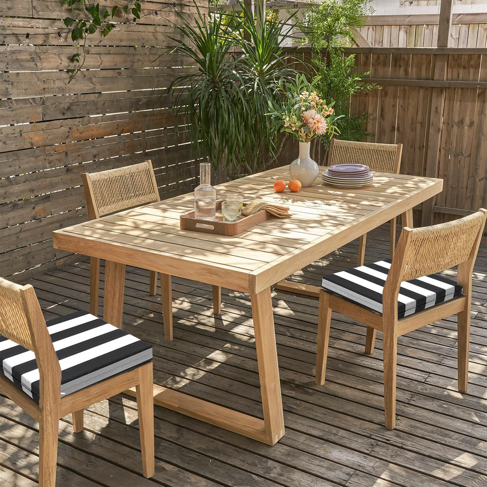 LVTXIII cushion on wicker chair demonstrating style and weather resistance