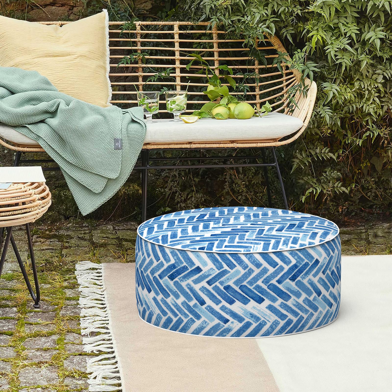 LVTXIII ottoman staged in garden adding colorful decorative seating