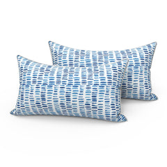 LVTXIII front view of two pebble blue lumbar pillows shows neat styling and support