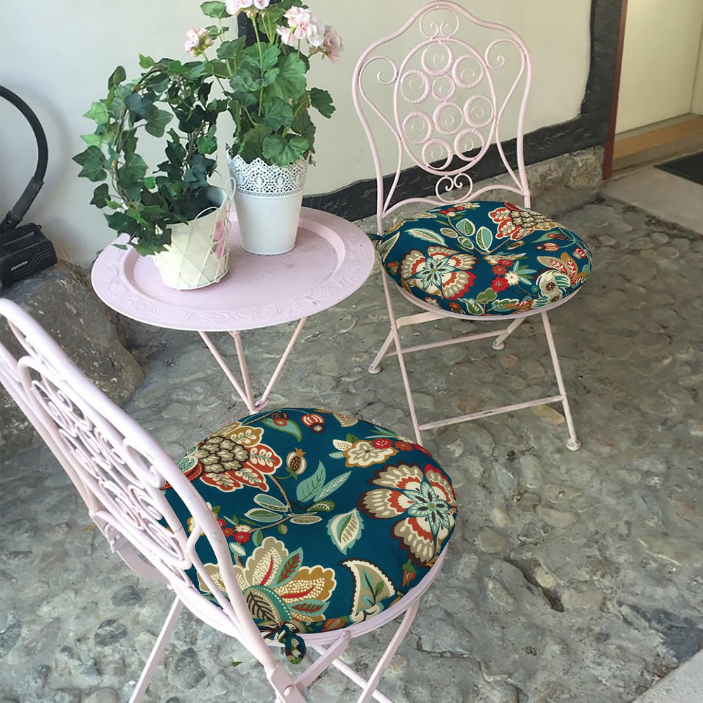LVTXIII two cushions styled on patio table adding color and comfort
