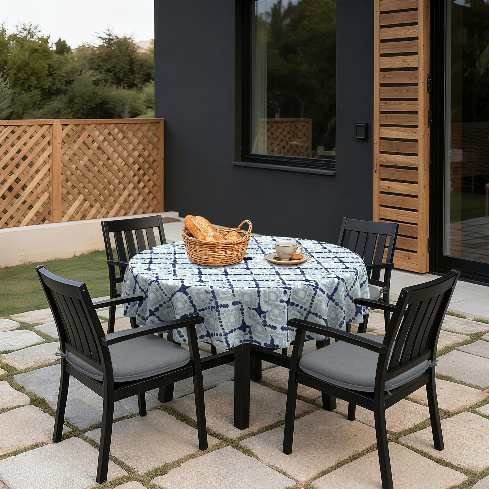 LVTXIII tablecloth in use on patio table showing stylish protection during outdoor dining