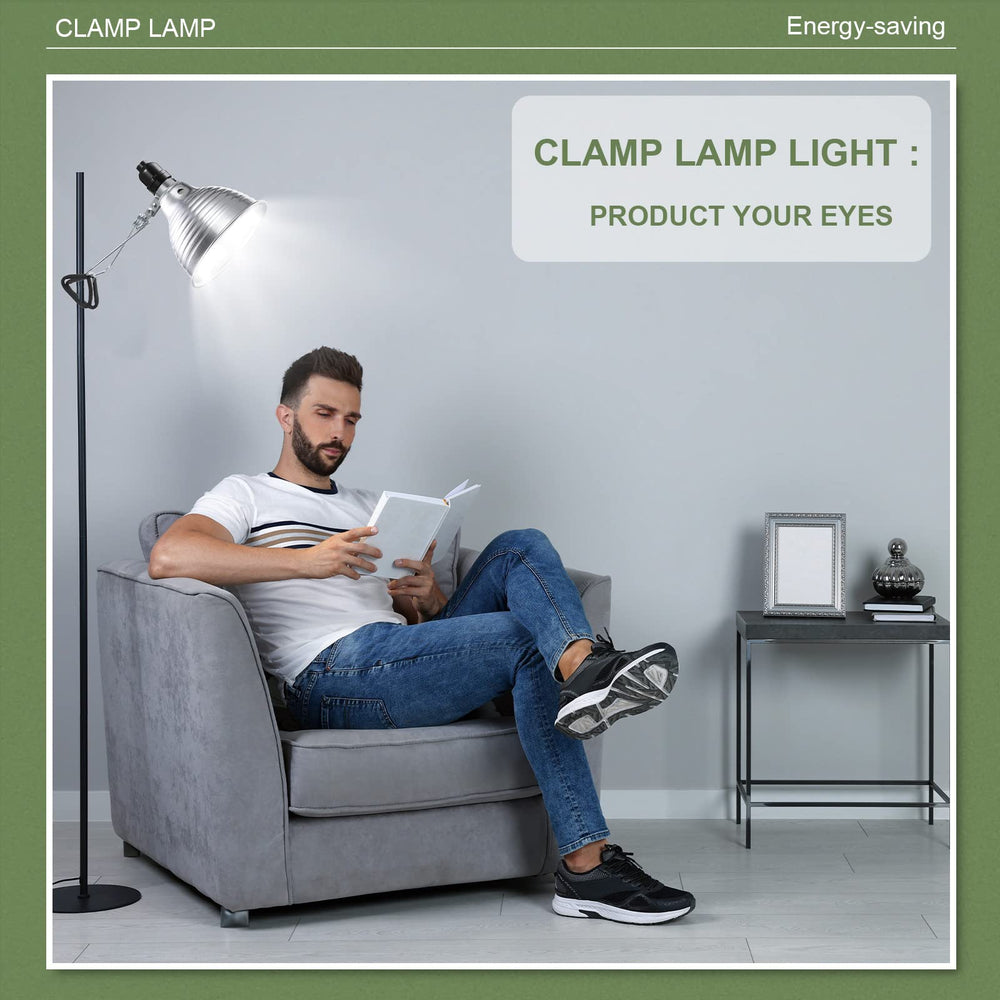 Macarrie lamp held in hand for size comparison showing compact footprint
