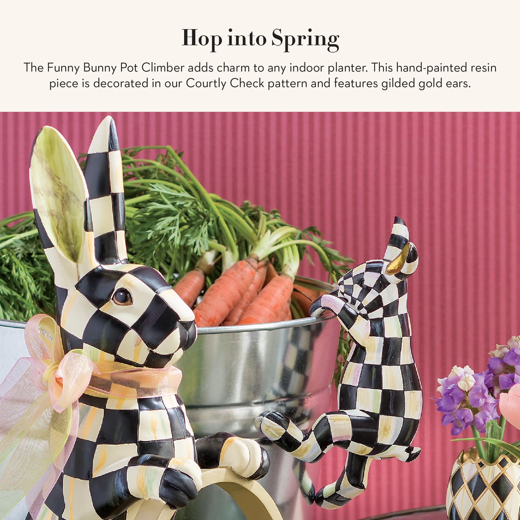 MACKENZIE-CHILDS Funny Bunny hanging on planter edge adding instant garden personality