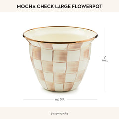 MACKENZIE-CHILDS planter with green plant on windowsill adding instant decor and garden feel