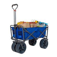 MacSports wagon in use on sand hauling gear with large wheels for stable transport