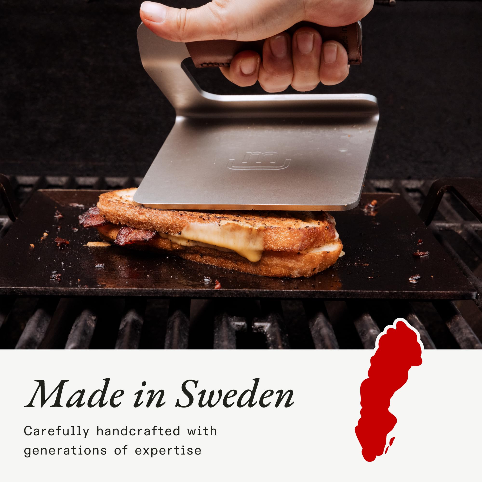 Made In grill press size comparison with hand to show compact portability benefit