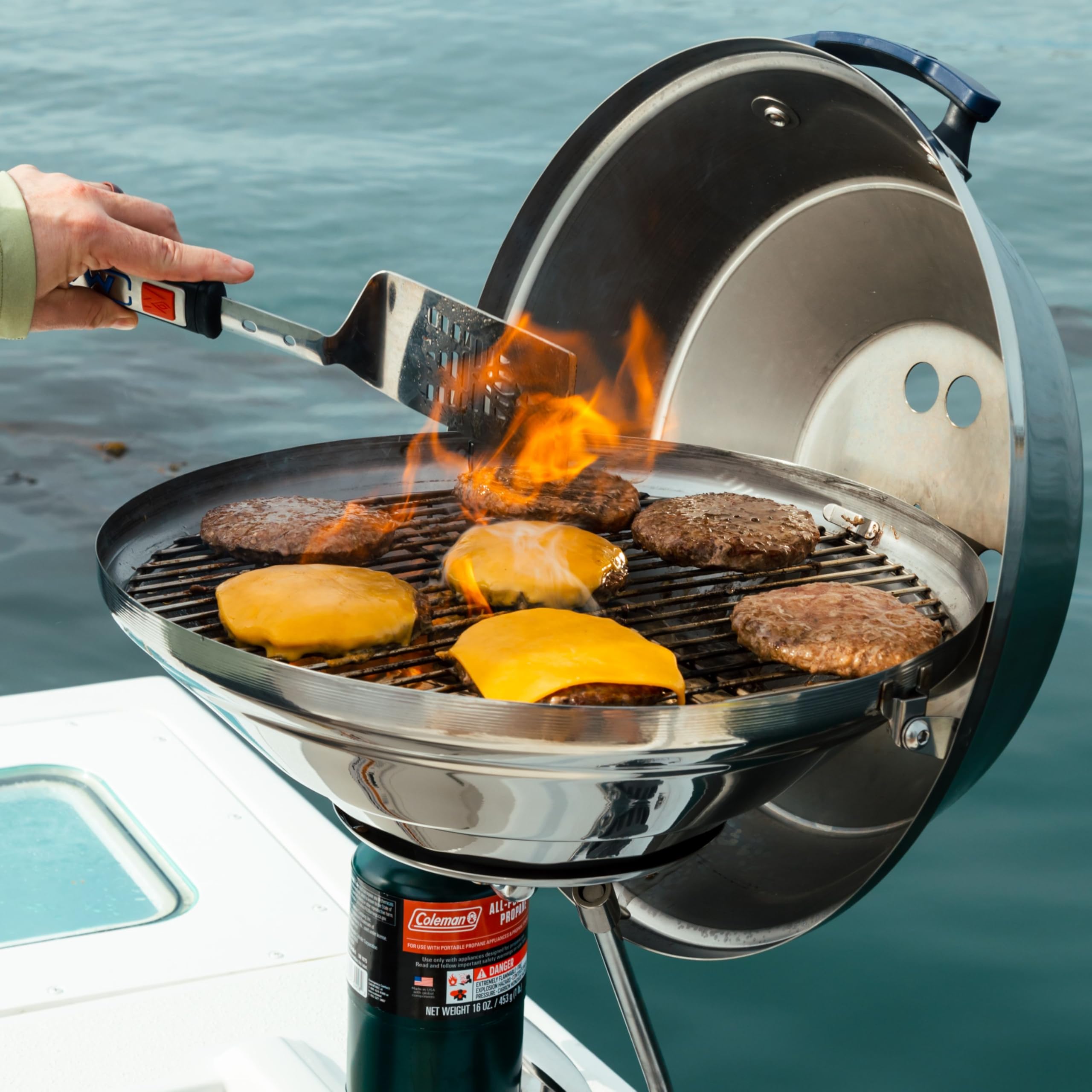 MAGMA next to 1lb propane canister showing compact, portable size and quick setup