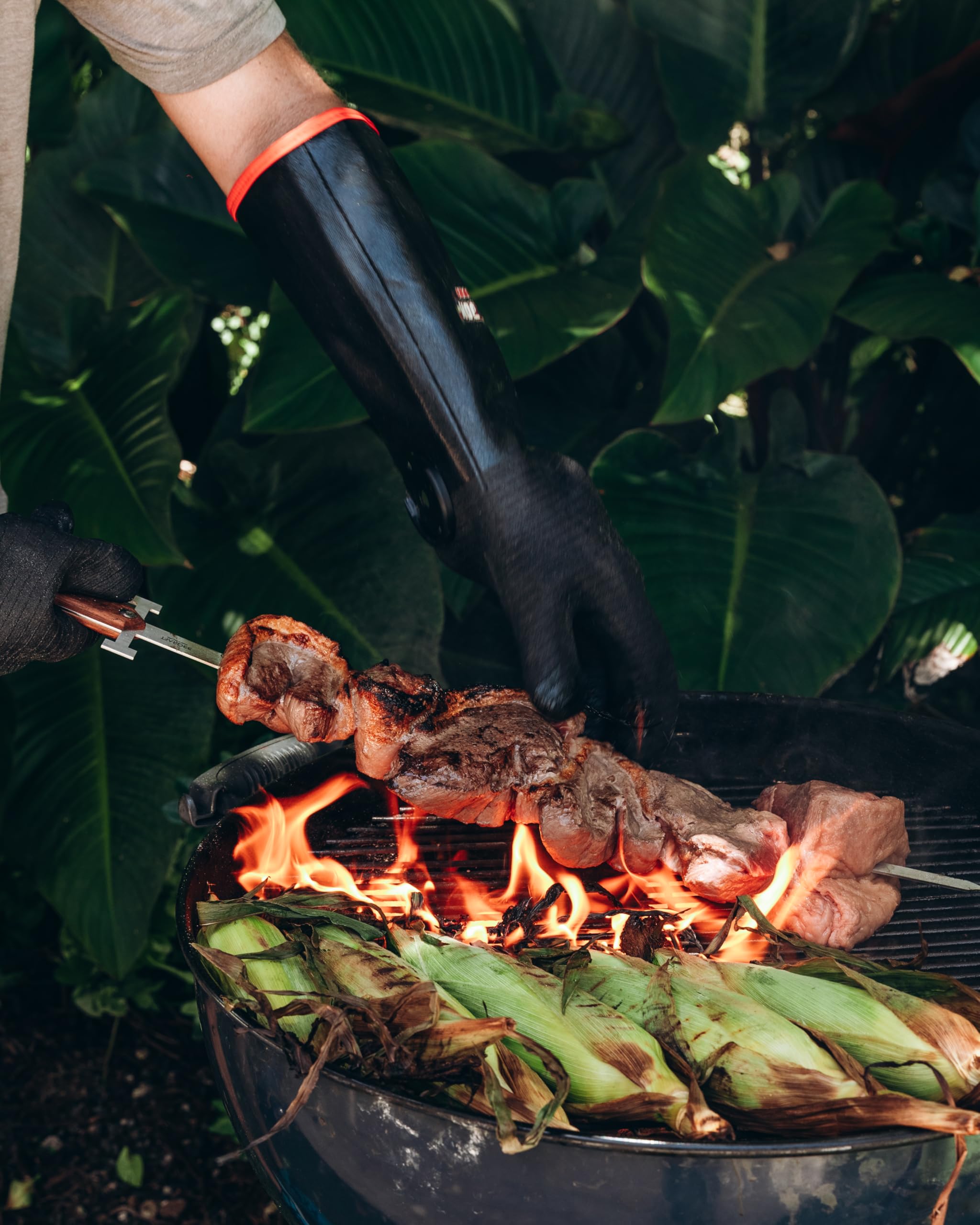 MagneCHEF holding hot cast iron pan demonstrating heat protection benefit