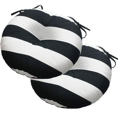 Magpie Fabrics front view of both black and white cushions showing neat tufting and clean finish