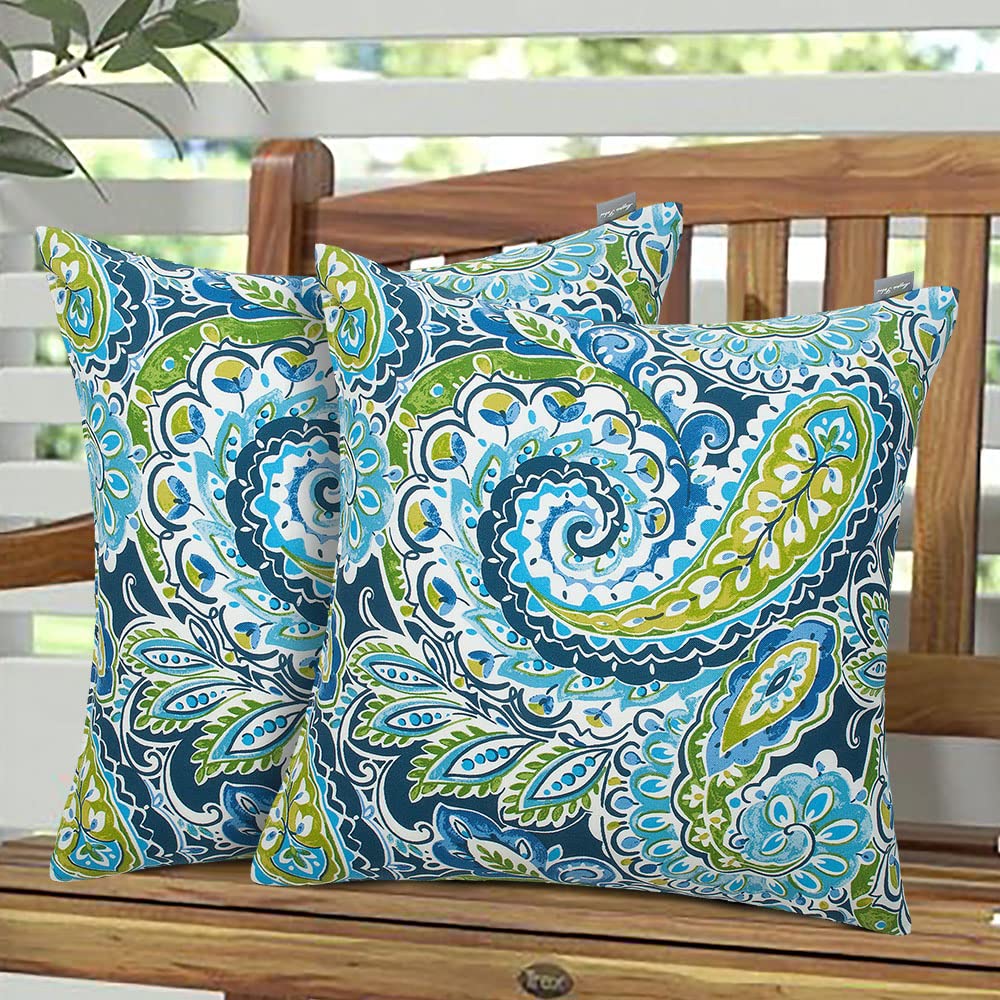 Magpie Fabrics front view of two paisley lapis green pillows shows coordinated elegance