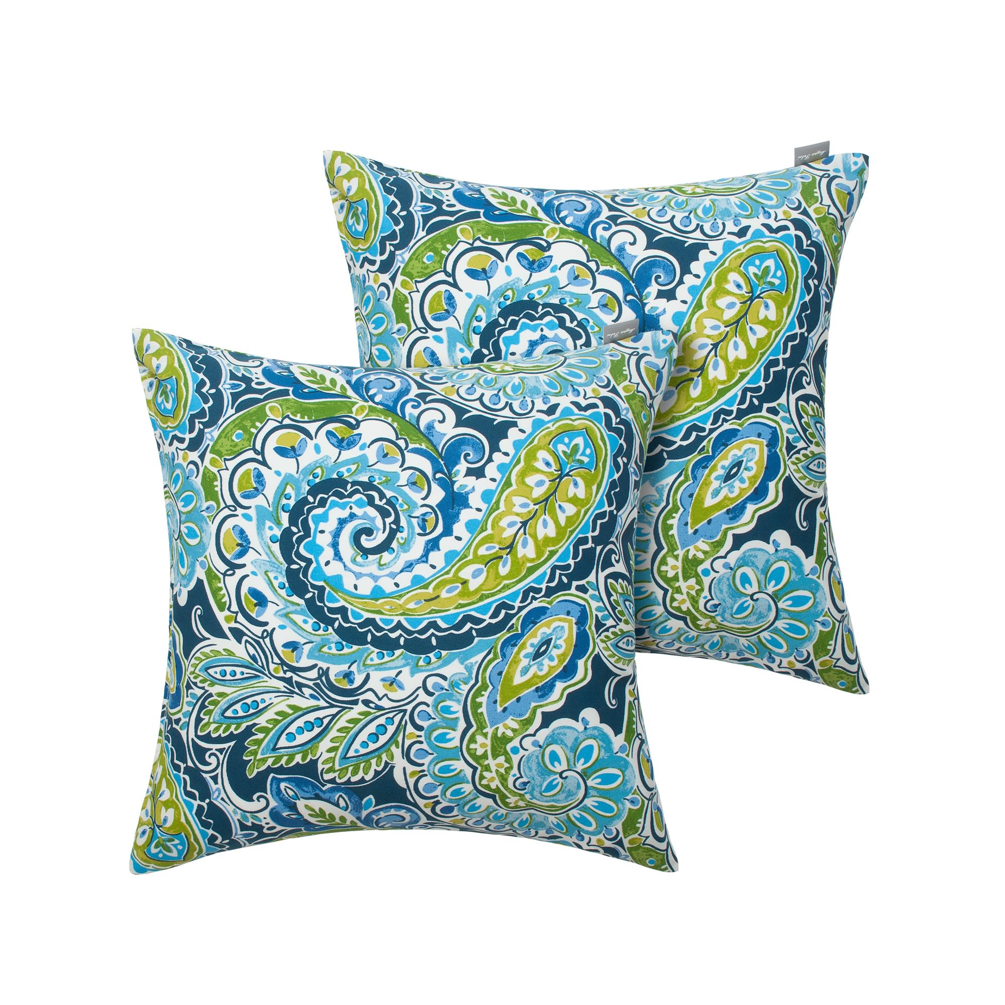 Magpie Fabrics pillow on sofa to show 18x18 inch scale and seating comfort