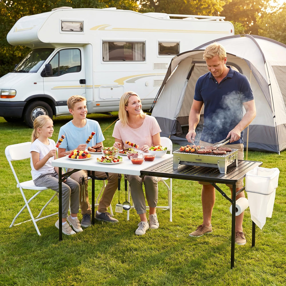 MAKE CHANGES table in use at a campsite enabling a complete outdoor kitchen