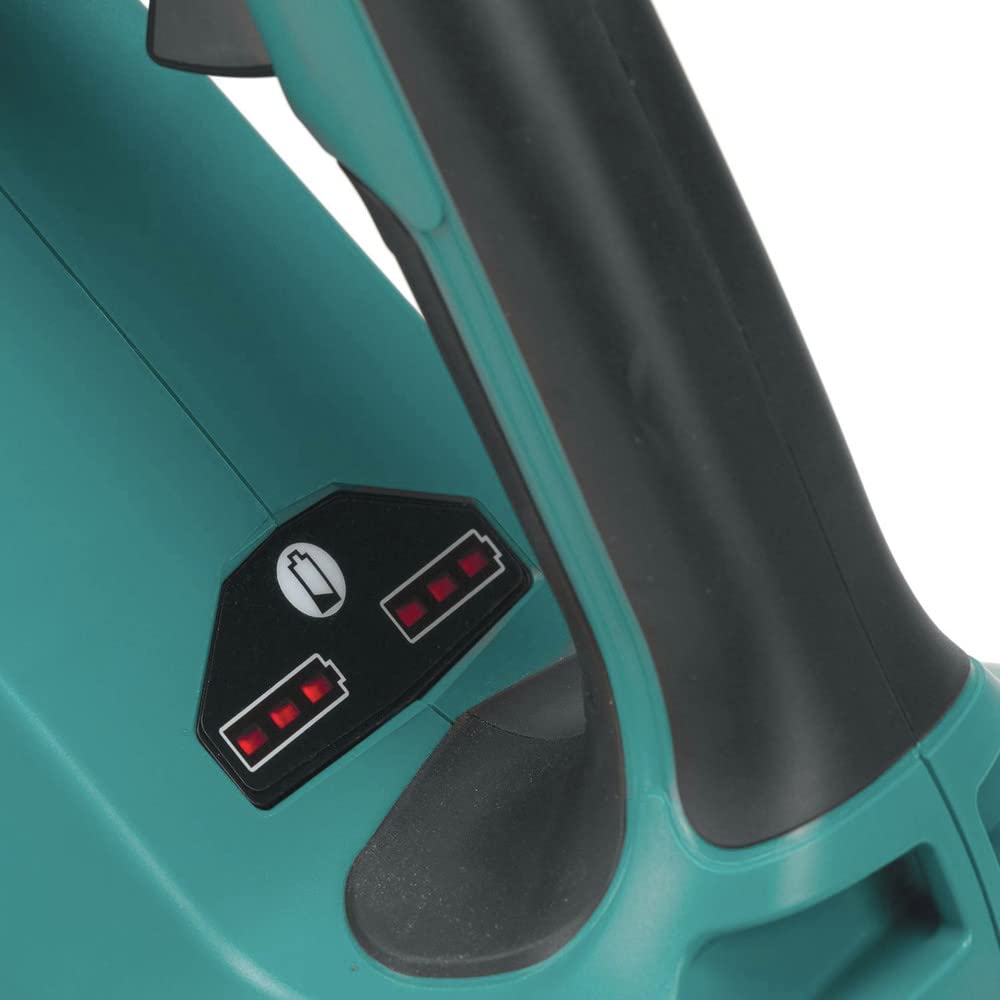 Makita blower next to rake shows compact length and ergonomic handling benefit