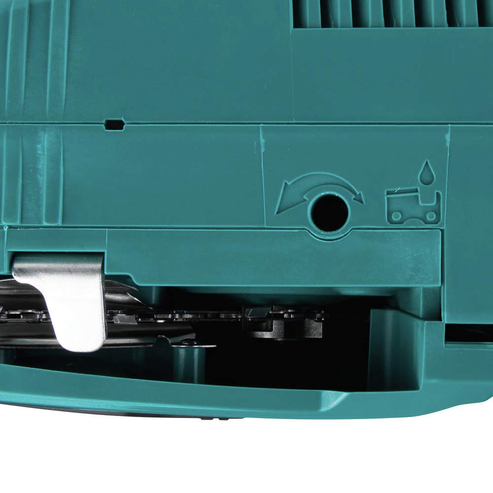 Makita XCU07PT cutting a limb in a yard demonstrating quiet, cordless operation benefit