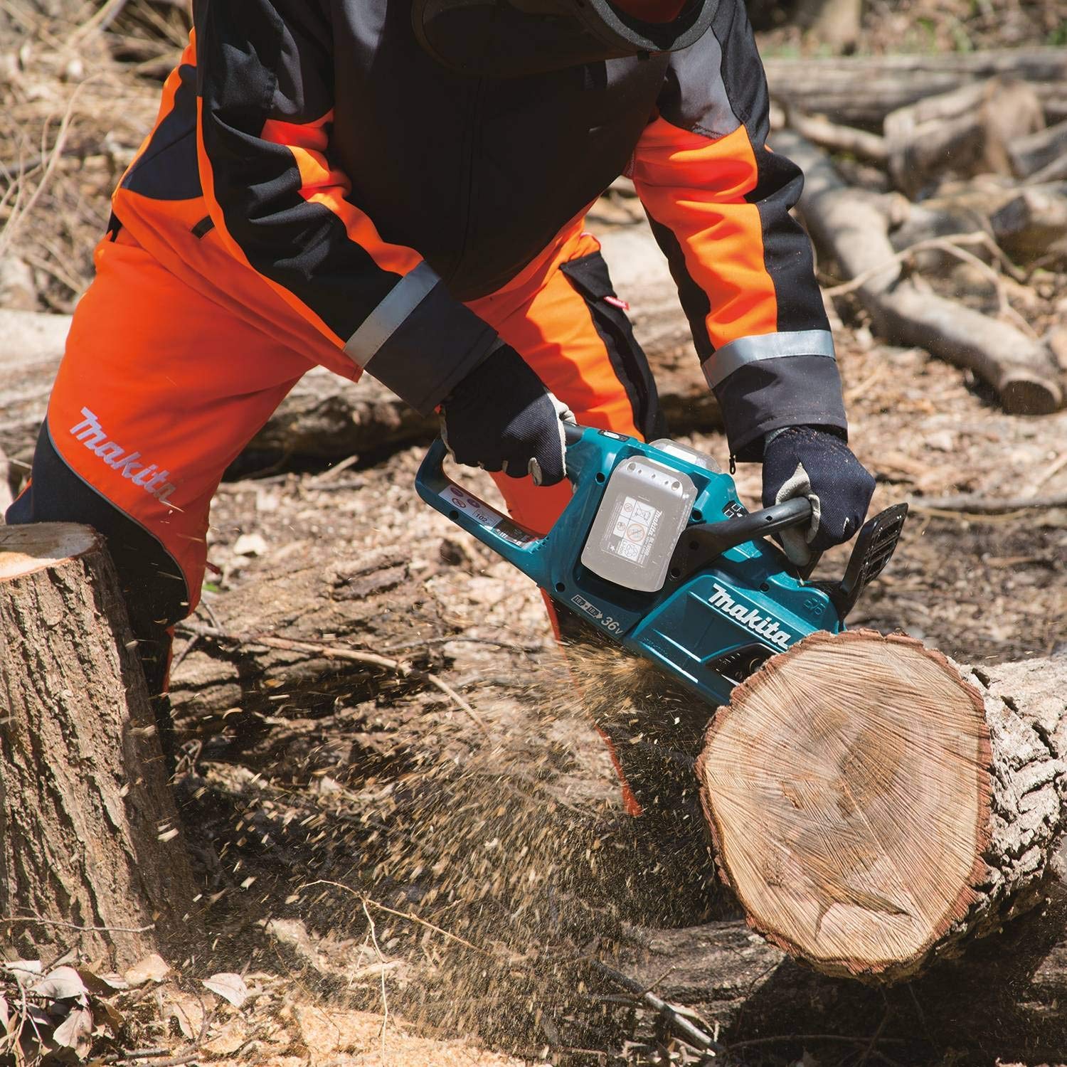 Makita XCU07Z cutting a branch outdoors to show cordless convenience and quiet jobsite operation