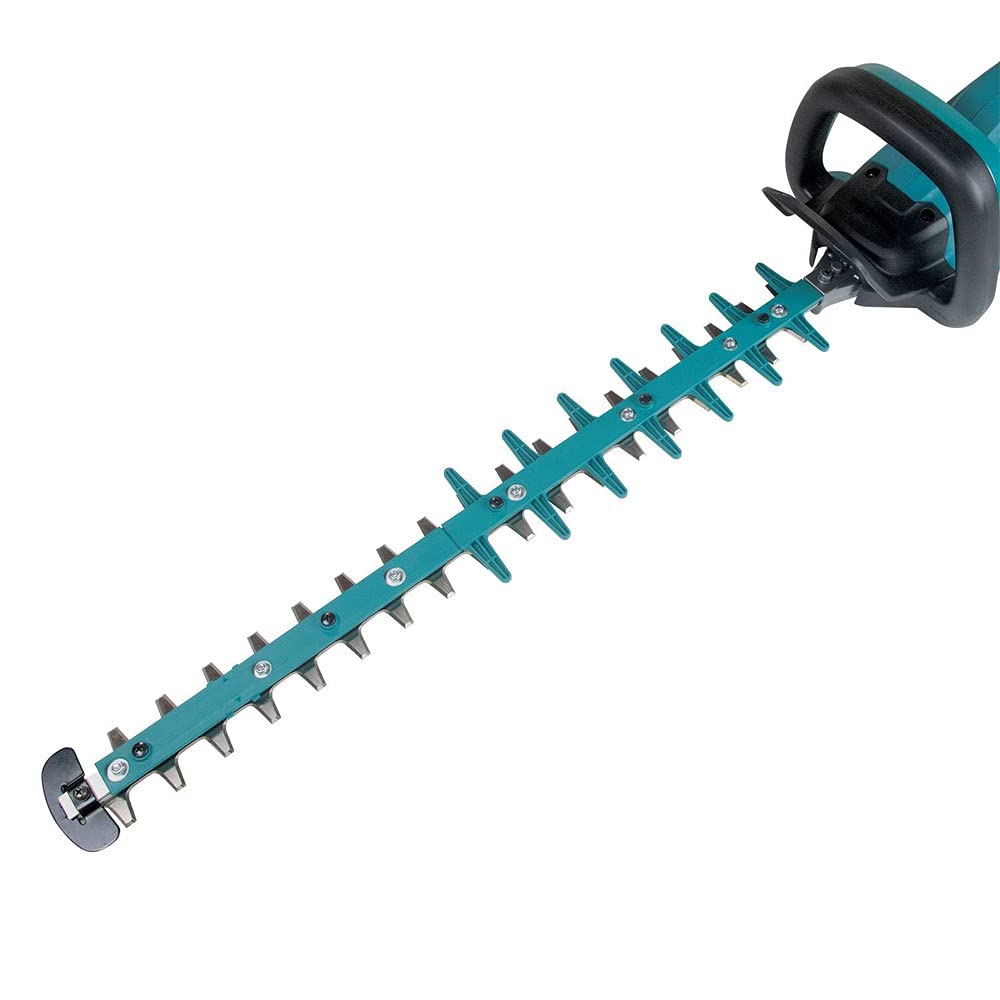 Makita XGT hedge trimmer in use by landscaper demonstrating cordless convenience and reach