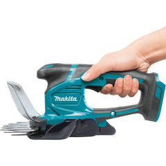 Makita soft-grip handle detail for comfort and controlled trimming