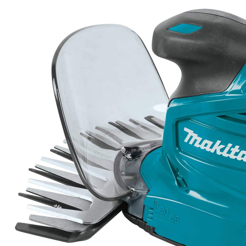 Makita in use trimming lawn edge for precise, neat borders