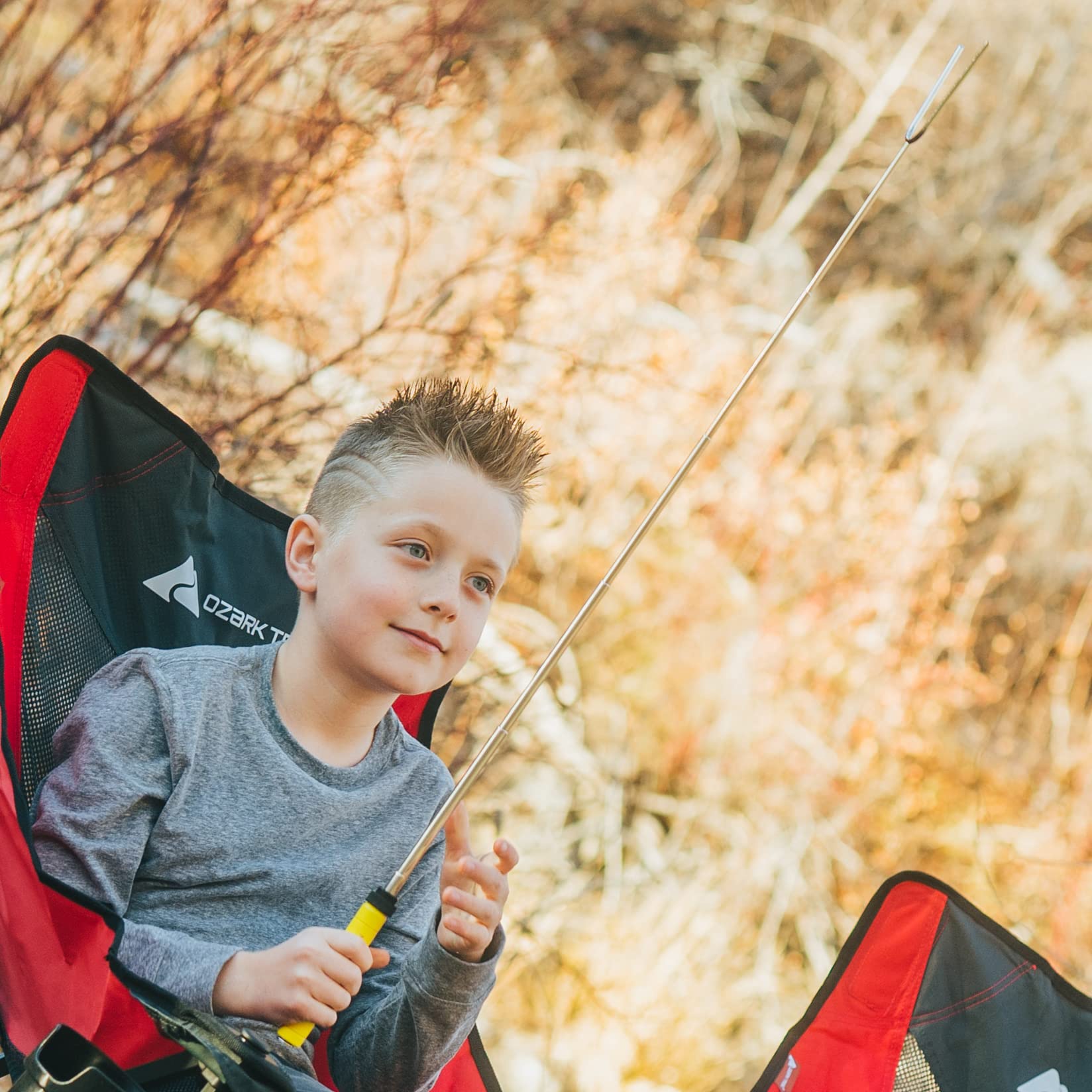 MalloMe sticks next to backpack showing compact travel convenience